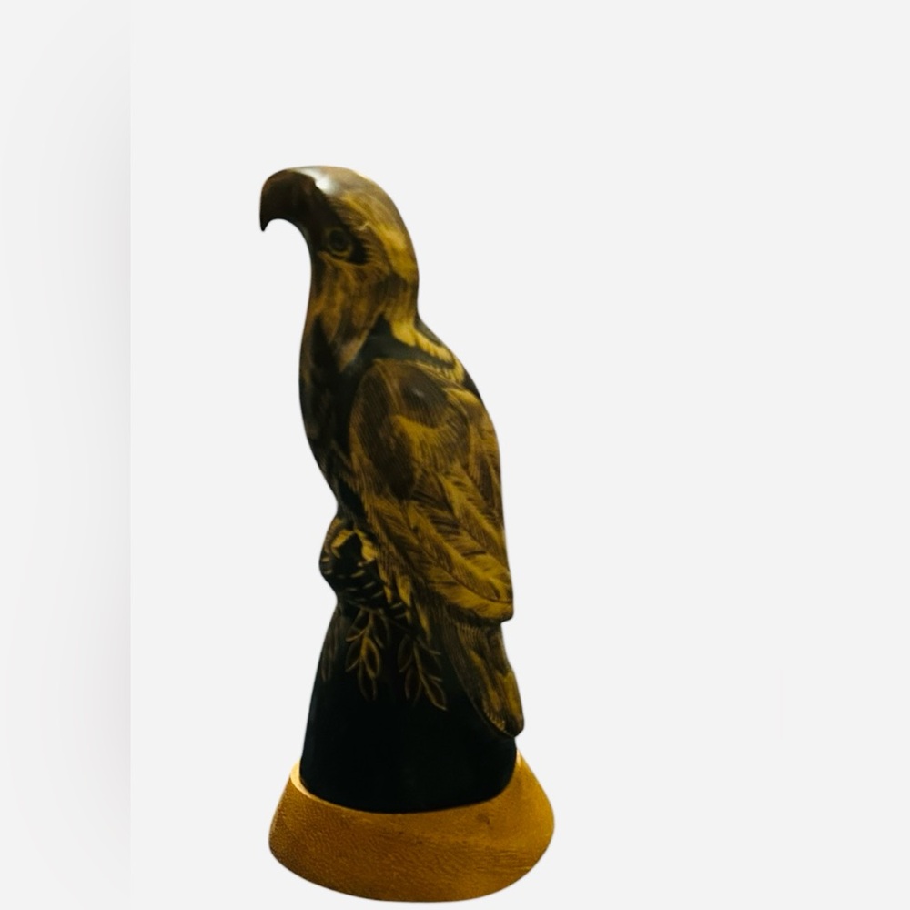 vintage, hand-carved sculpture of an eagle or hawk from genuine buffalo horn
